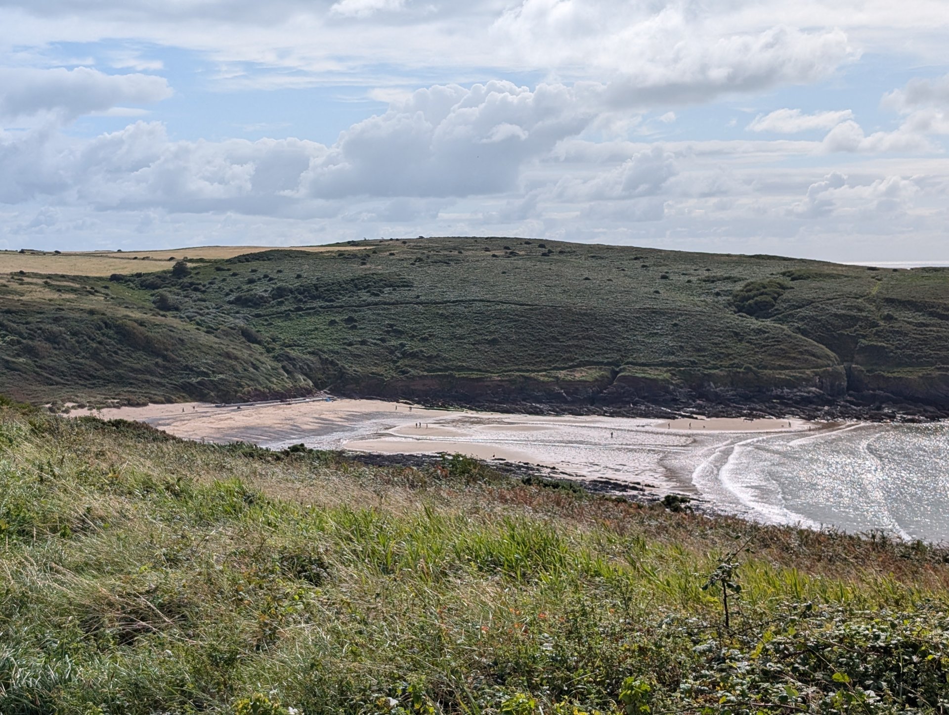 Dramatic ocean cliffs and turquoise water along Pembrokeshire coastline