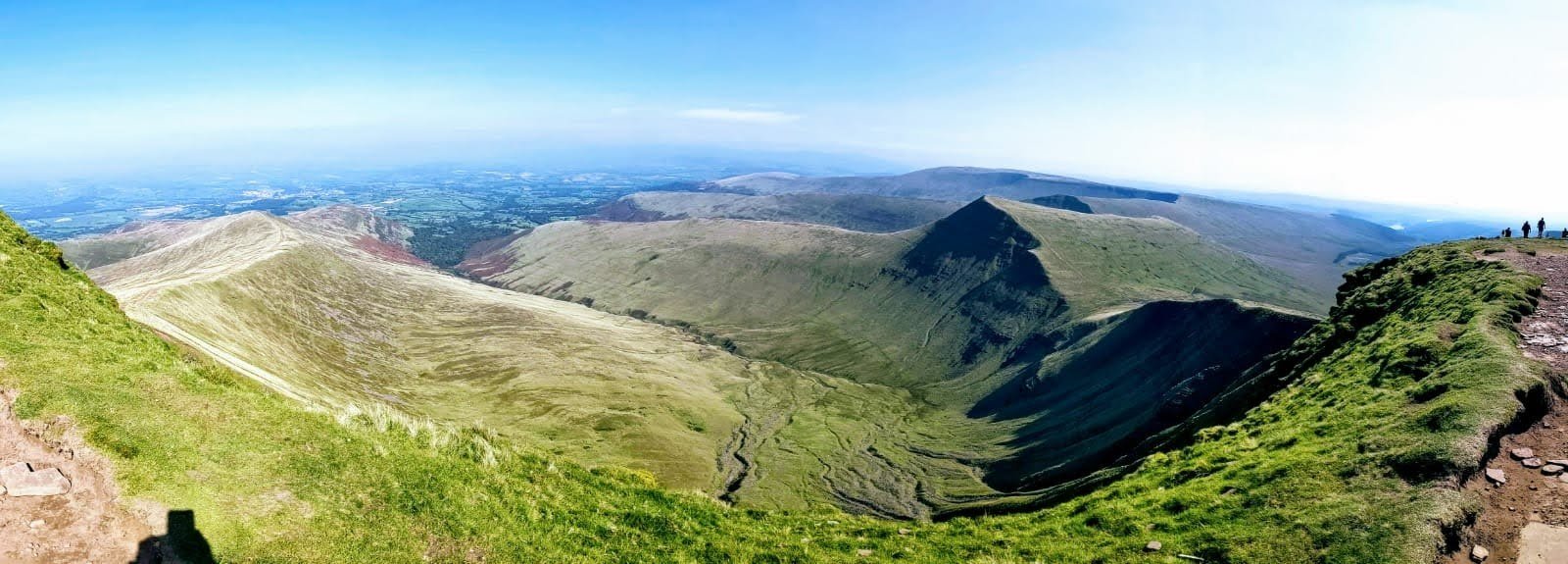 Panoramic view of Pen y Fan peak and rolling Brecon Beacons ridges