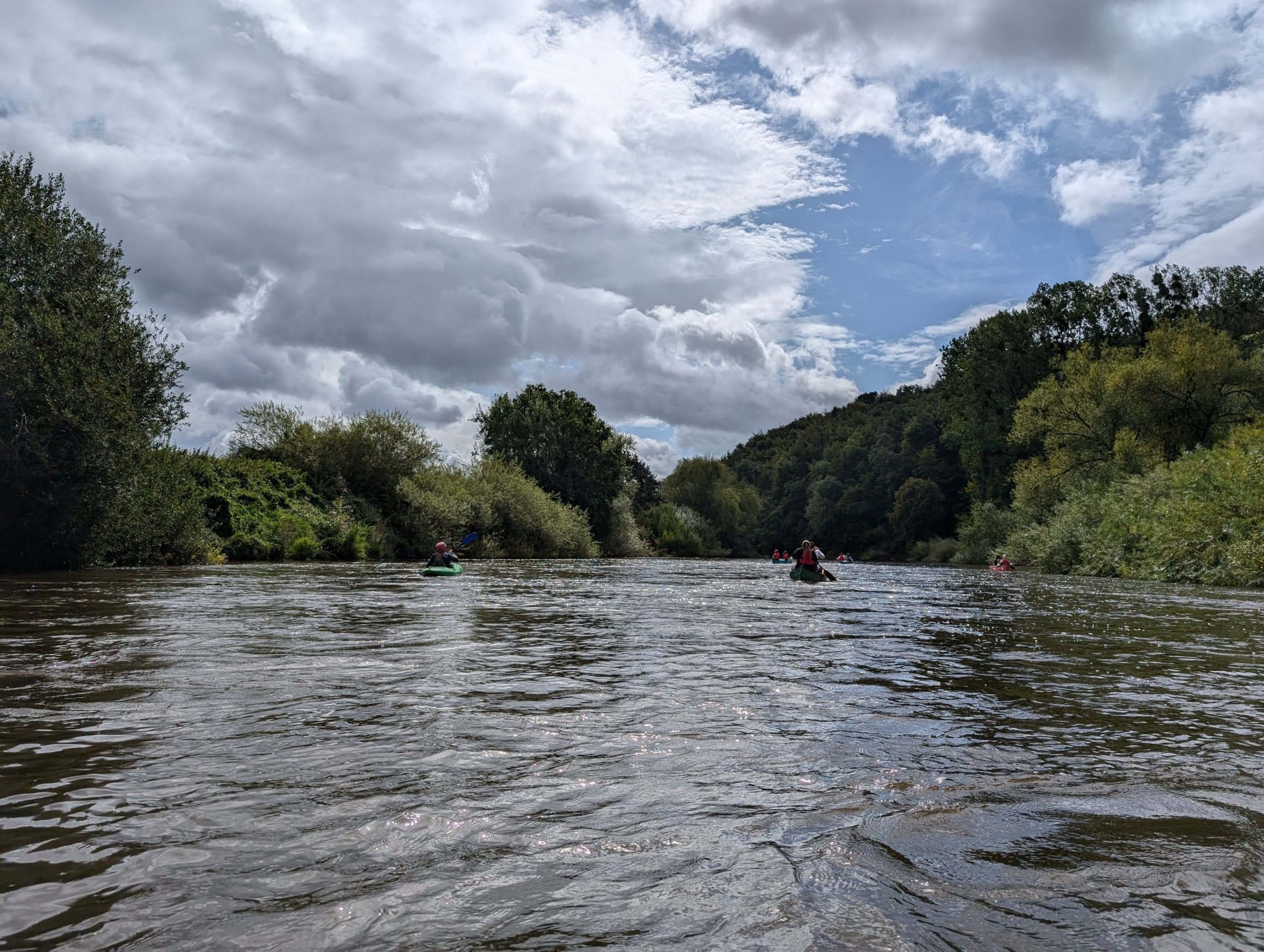River Wye winding through lush green hills and woodland in Wye Valley